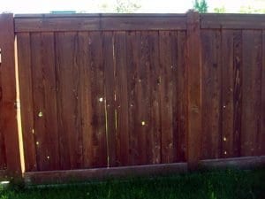 Wood-Fence-with-Holes-and-Gaps 1