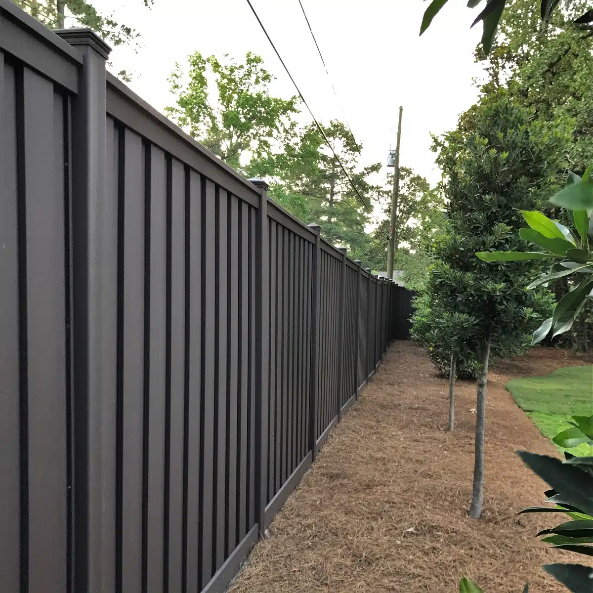 An 8 ft. tall Trex privacy Fence in a South Carolina residence's backyard. 