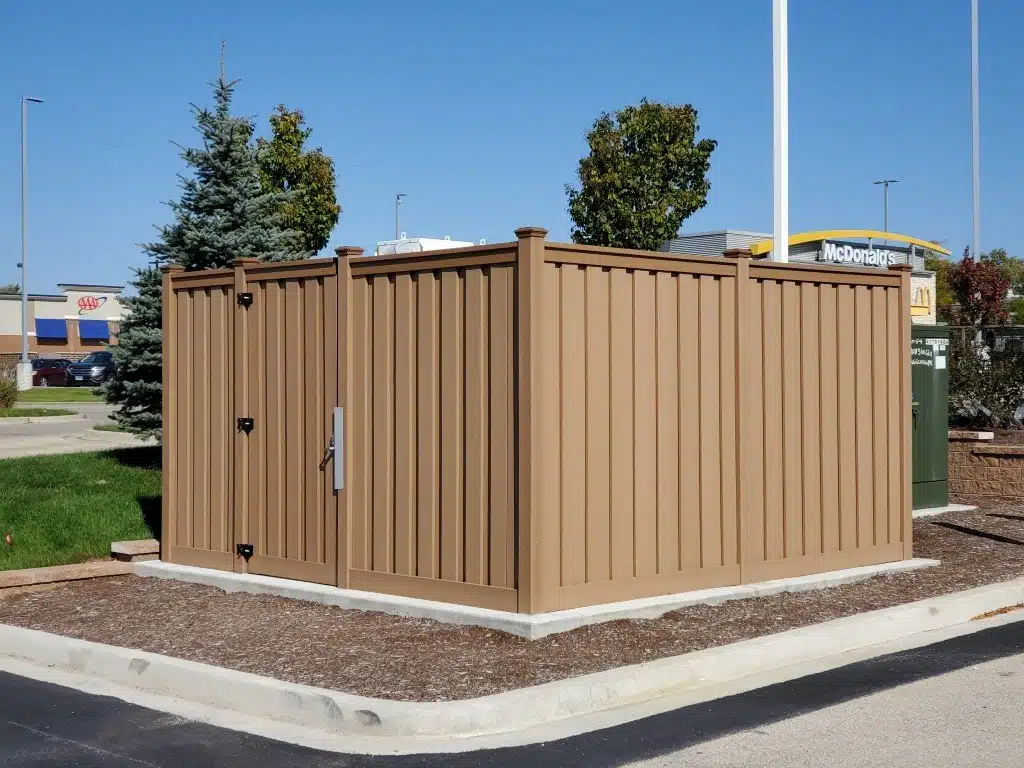 A commercial property equipment enclosure near a McDonald's in the Chicagoland area.