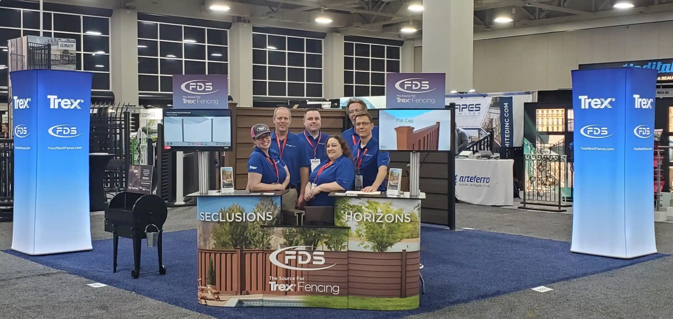 A picture of FDS Fence Distributors employees at the Trex Fencing booth at Fencetech Salt Lake City 2020