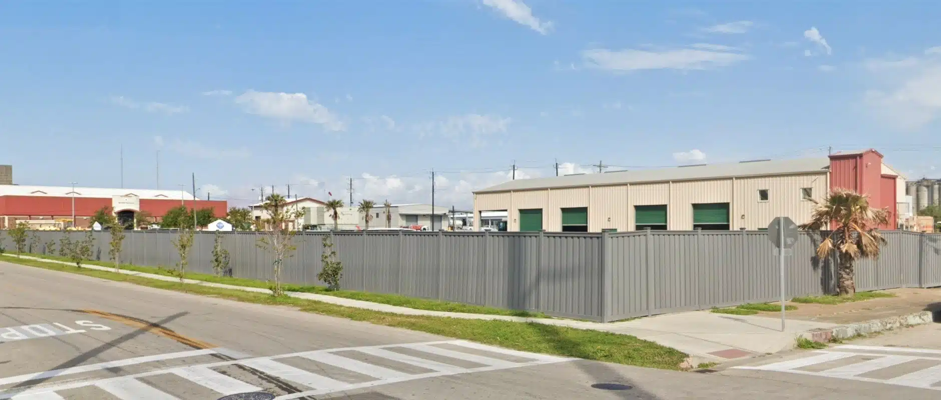 Commercial fencing for the perimeter around the Municipal Utility District (MUD) facility in Galveston TX. Built with Trex Seclusions Fencing.