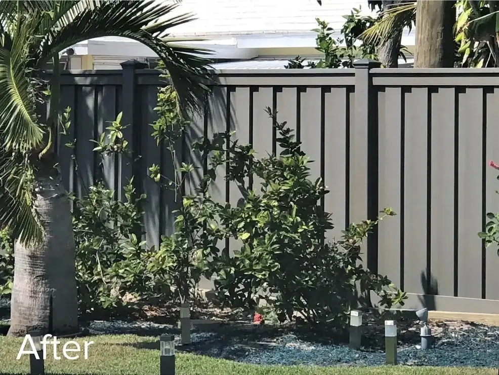 A Trex fence that has repalced a damaged wooden fence. Rebuild with Trex.