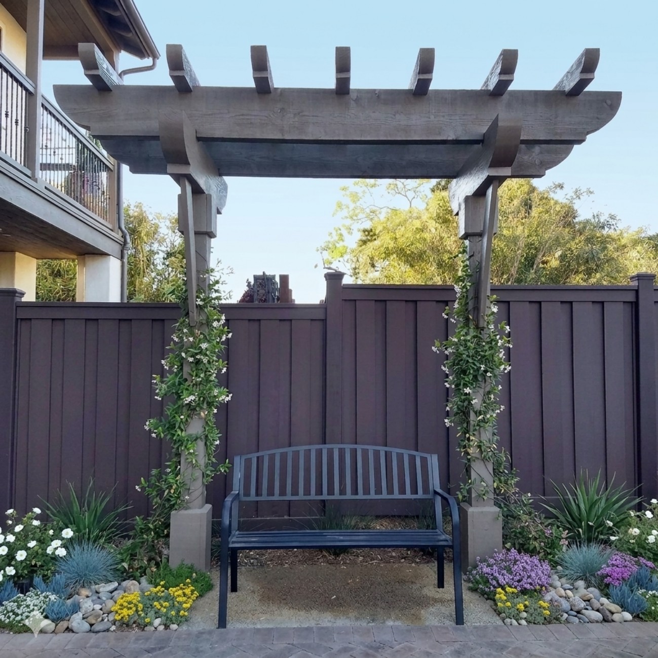 Backyard Trex privacy fence installation